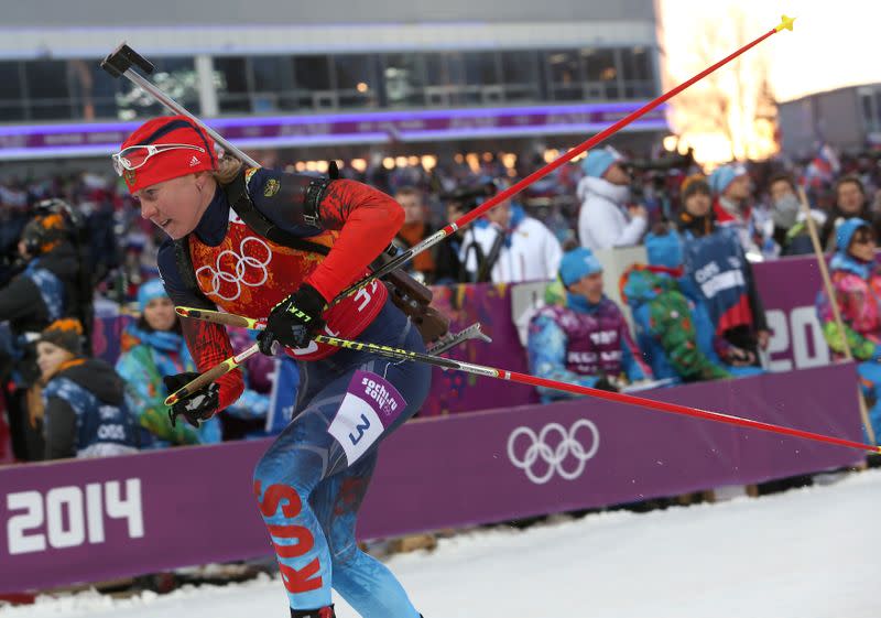 Russia's Romanova skis during the women's biathlon 4 x 6 km relay event at the Sochi 2014 Winter Olympic Games in Rosa Khutor