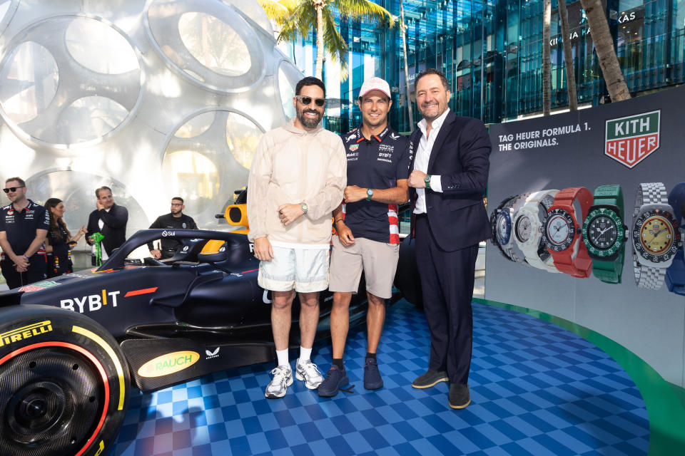 MIAMI, FLORIDA - MAY 02: (L-R) Ronnie Fieg, Checo Perez and CEO of Tag Heuer Julien Tornare at TAG Heuer Miami Design Boutique on May 02, 2024 in Miami, Florida.  (Photo by John Parra/Getty Images for TAG Heuer )