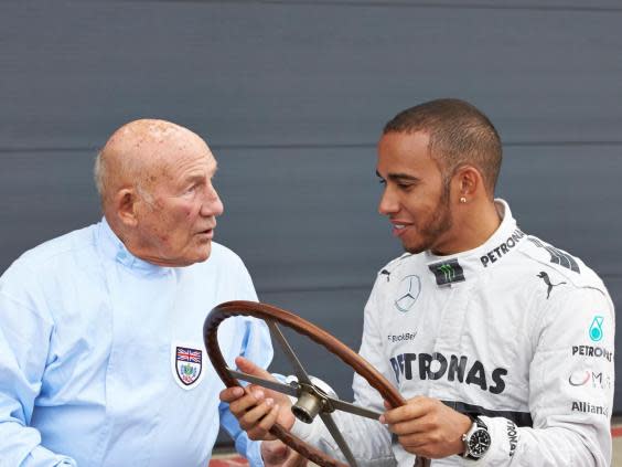 Lewis Hamilton with Sir Stirling Moss in 2013 (Getty)