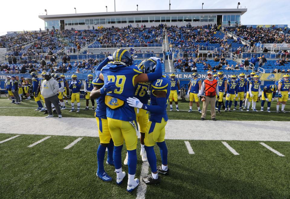 The Delaware defensive backfield gathers before taking on Villanova at Delaware Stadium, Saturday, Nov. 20, 2021.