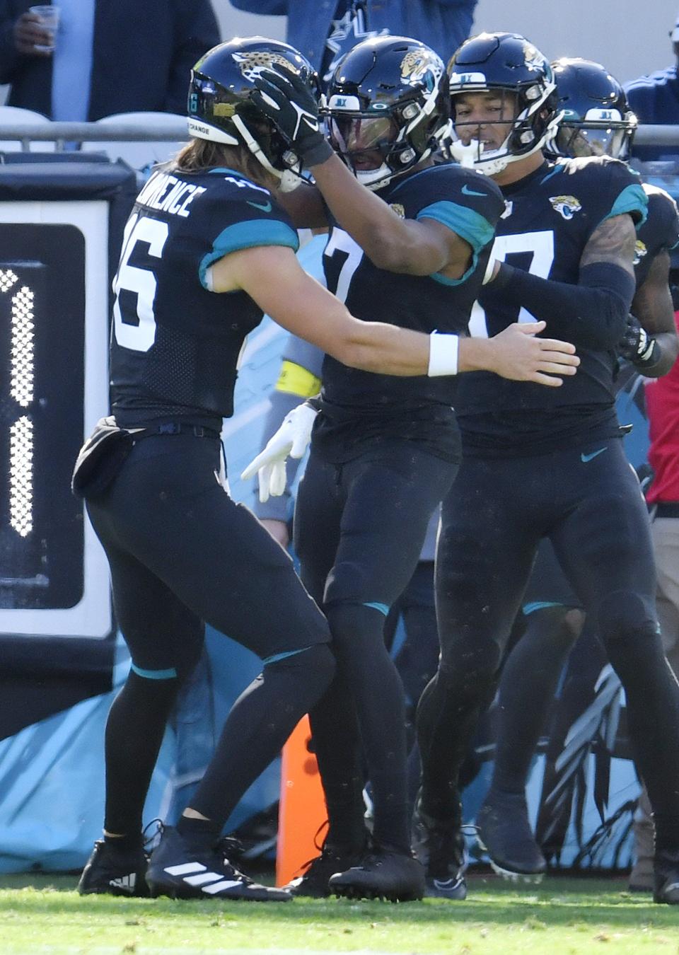 Jacksonville Jaguars wide receiver Zay Jones (7) celebrates with quarterback Trevor Lawrence (16) after they connected on their second quarter touchdown pass. The Jacksonville Jaguars hosted the Dallas Cowboys at TIAA Bank Field Sunday, December 18, 2022. The Jaguars trailed 21 to 7 at the half. [Bob Self/Florida Times-Union]