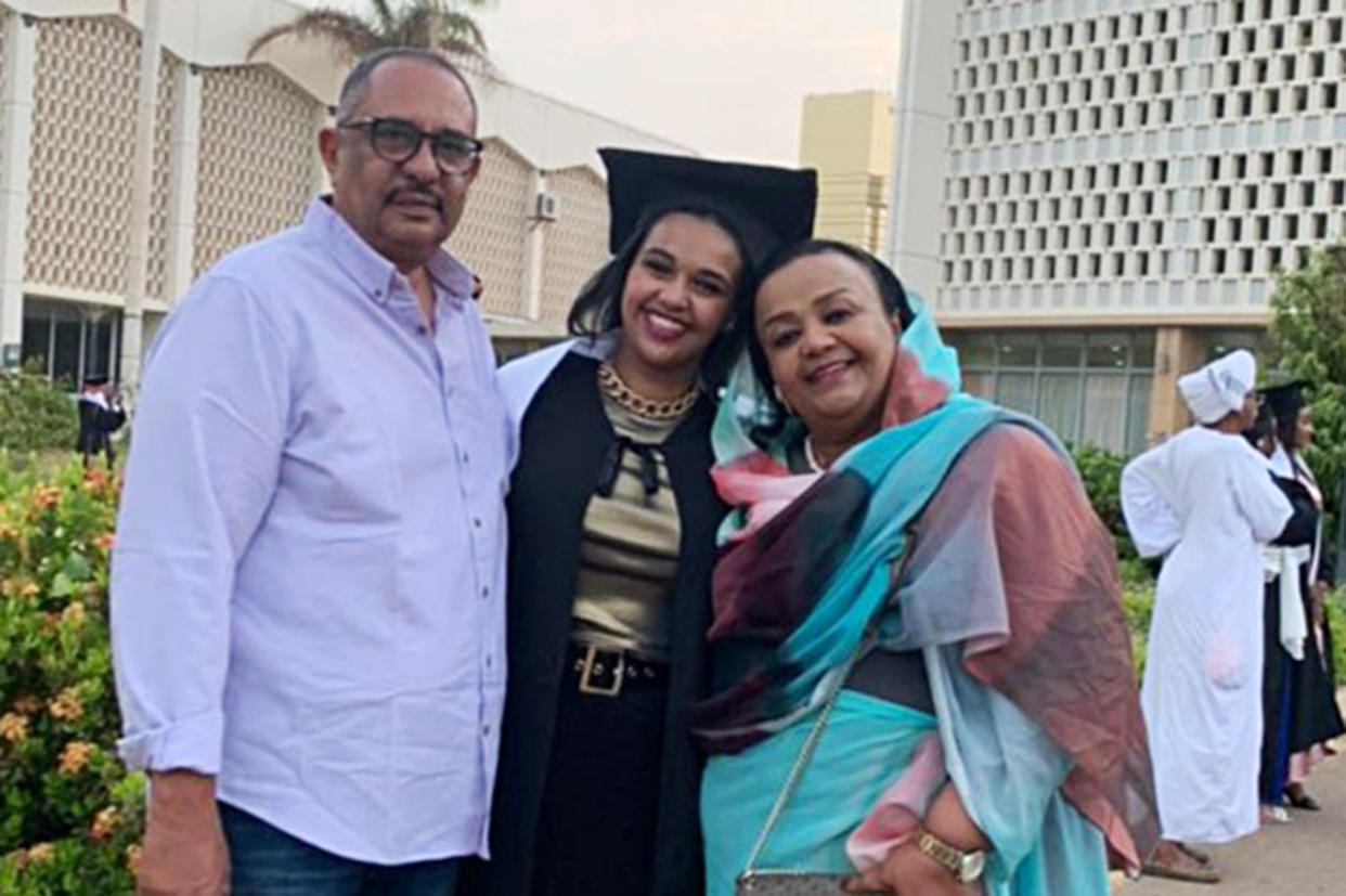 Zaria Suleiman, right, with her husband and one of her daughters at a university graduation in Khartoum. (Courtesy of Zaria Suleiman)