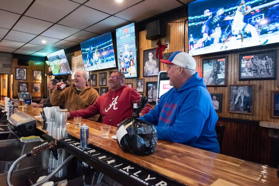 From left, John Tobar, George Berdomas and Dave Keebler, of Levittown, sit together at the bar inside Gleason's, in Levittown, on Tuesday, February 6, 2024.