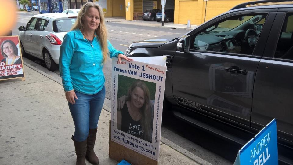 Teresa van Lieshout stands with campaign posters ahead of the 2019 Federal Election in Cooper. Source: Facebook