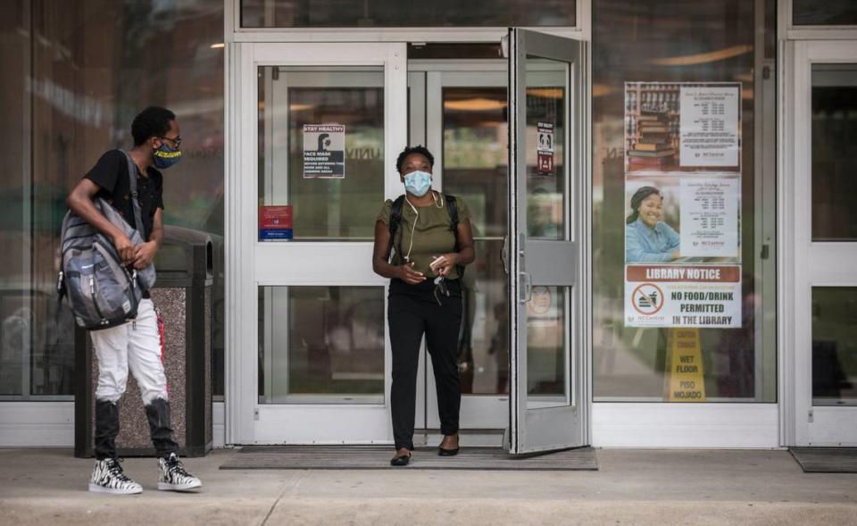 Graduate student Alonda McEachin walks out of the James E. Shepard Memorial Library at N.C. Central University in Durham, N.C. on the first day of classes, Monday, Aug. 24, 2020.