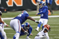 New York Giants kicker Graham Gano (5) watches the ball after booting a 49-yard field goal during the first half of NFL football game against the Cincinnati Bengals, Sunday, Nov. 29, 2020, in Cincinnati. (AP Photo/Aaron Doster)