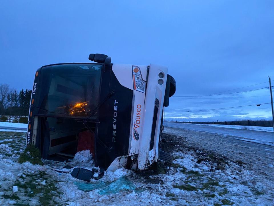 The passengers were travelling to Montreal when wind gusts flipped the bus just after 5 a.m.