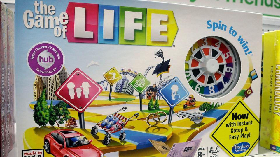 Mandatory Credit: Photo by Steven Senne/AP/Shutterstock (6079674b)The Hasbro board game "The Game of Life" rests on a shelf in a toy store in North Attleboro, Mass.