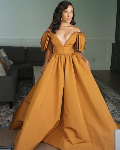 <p>Robin Thede is a dress by Christian Siriano, shoes by Stuart Weitzman, rings by Jennifer Fisher, and earrings by Misho Designs. </p><p><a href="https://www.instagram.com/p/CFYBBWxFe2u/" rel="nofollow noopener" target="_blank" data-ylk="slk:See the original post on Instagram;elm:context_link;itc:0;sec:content-canvas" class="link ">See the original post on Instagram</a></p>