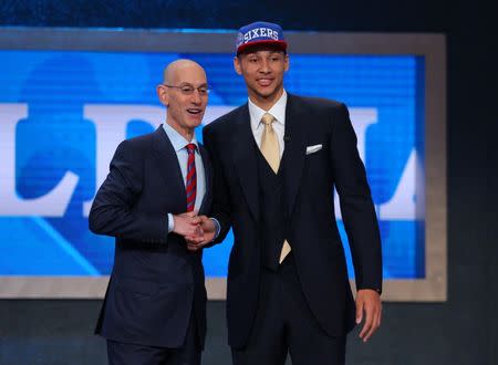 Jun 23, 2016; New York, NY, USA; Ben Simmons (LSU) greets NBA commissioner Adam Silver after being selected as the number one overall pick to the Philadelphia 76ers in the first round of the 2016 NBA Draft at Barclays Center. Mandatory Credit: Brad Penner-USA TODAY Sports