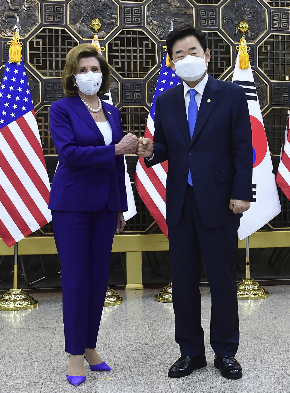 U.S. House Speaker Nancy Pelosi, left, poses with South Korean National Assembly Speaker Kim Jin Pyo before their meeting at the National Assembly in Seoul, South Korea Thursday, Aug. 4, 2022. (Kim Min-Hee/Pool Photo via AP)