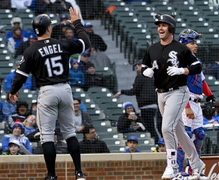 May 12, 2018; Chicago, IL, USA; Chicago White Sox designated hitter Matt Davidson (24) smiles as he trots home on a three run home run and is greeted by center fielder Adam Engel (15) against the Chicago Cubs in the eighth inning at Wrigley Field. Mandatory Credit: Matt Marton-USA TODAY Sports