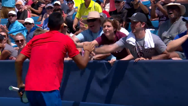 Kyrgios celebrates with fans. Pic: TennisTV