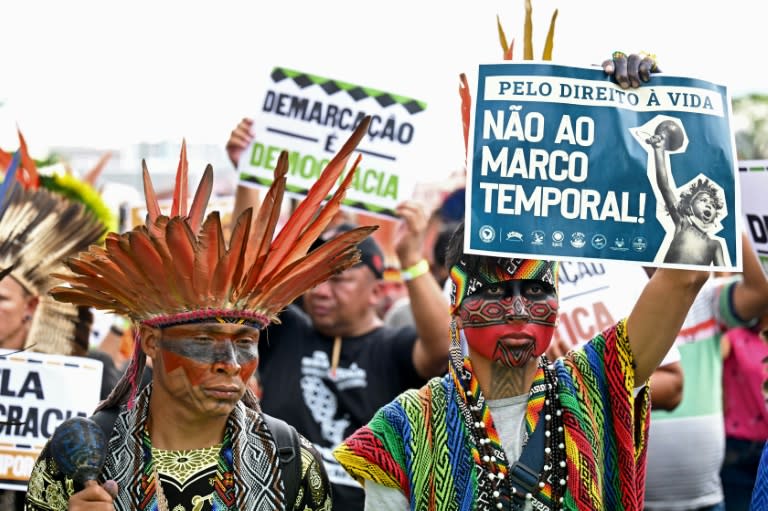Brazilian Indigenous people from different tribes protest against the Temporary Framework Law after the Supreme Court resumed hearings in the case on whether to restrict native peoples' rights to claim ancestral lands, in Brasilia August 30, 2023 (Evaristo SA)
