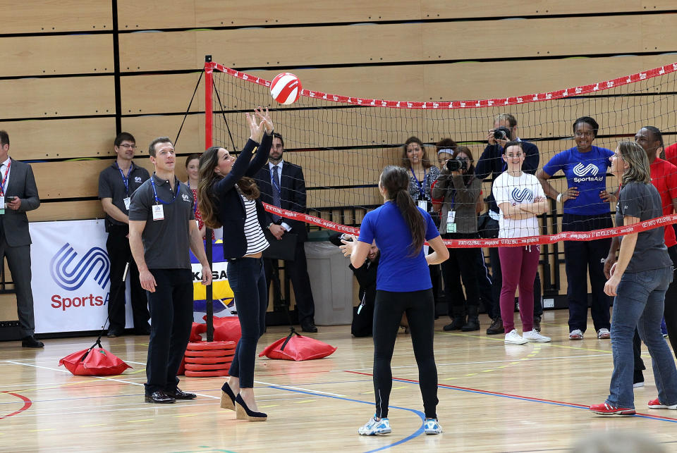 LONDON, ENGLAND - OCTOBER 18:  Catherine, Duchess of Cambridge is seen playing Volleyball at a Sportaid athlete workshop at the Copper Box in the Queen Elizabeth Olympic Park on October 18, 2013 in London, England.  (Photo by Danny Martindale/WireImage)