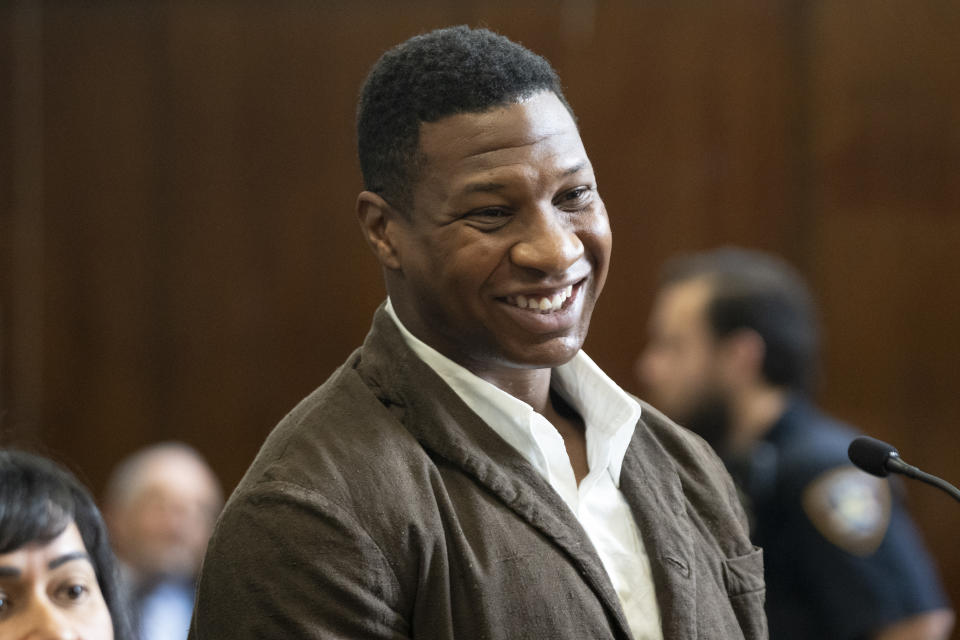 Jonathan Majors stands in court during a hearing in his domestic violence case, Tuesday, June 20, 2023 in New York. Majors’ domestic violence case will go to trial Aug. 3, the judge said Tuesday, casting him in a real-life courtroom drama as his idled Hollywood career hangs in the balance.(AP Photo/Steven Hirsch, Pool)