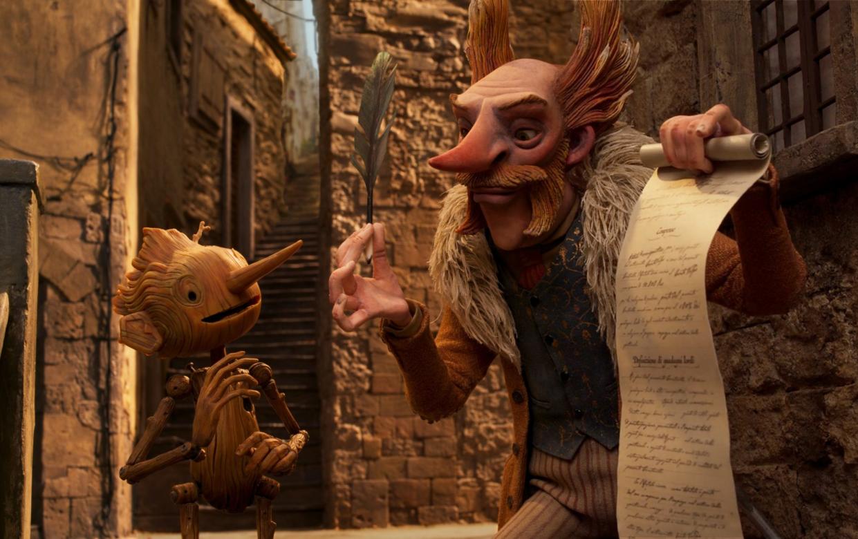 Pinocchio (voiced by Gregory Mann) and Volpe (voiced by Christoph Waltz) - Netflix