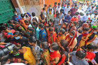 Rajasthan Basic School Training Course (BSTC) students stand outside a centre to appear for the exams amid the ongoing coronavirus pandemic, in Jaipur, Rajasthan, India, on August 31, 2020. (Photo by Vishal Bhatnagar/NurPhoto via Getty Images)