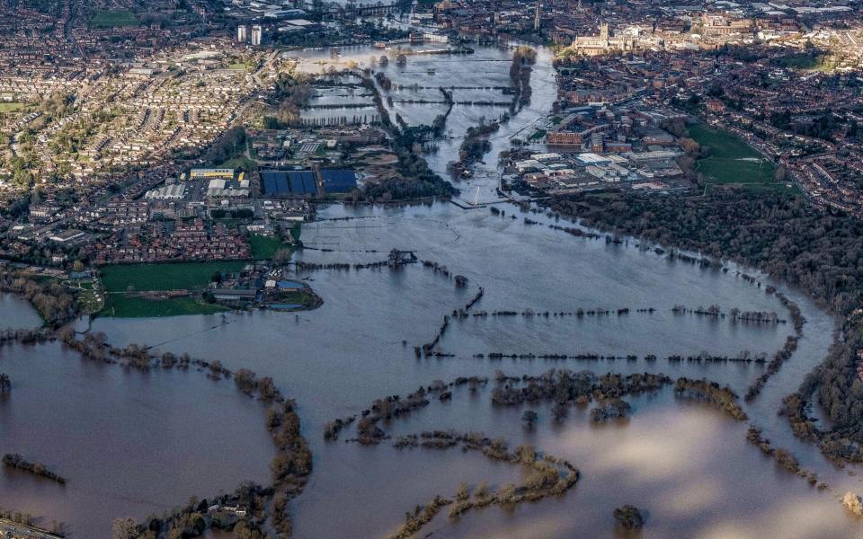 Aerial view of Worcester, Worcestershire, after the River Severn has broken its banks - SWNS