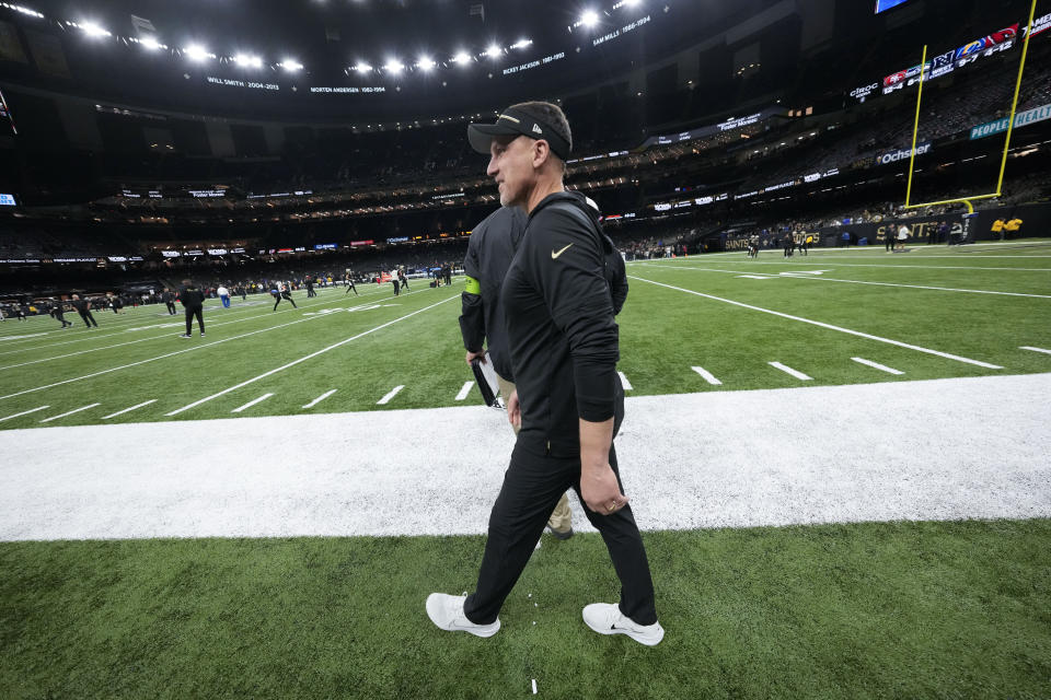 New Orleans Saints head coach Dennis Allen walks the field during ups before an NFL football game against the in New Orleans, Sunday, Jan. 7, 2024. (AP Photo/Gerald Herbert)