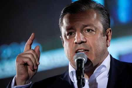 Prime Minister and leader of ruling Georgian Dream party Giorgi Kvirikashvili speaks during a rally after the parliamentary elections in Tbilisi, Georgia, October 8, 2016. REUTERS/David Mdzinarishvili