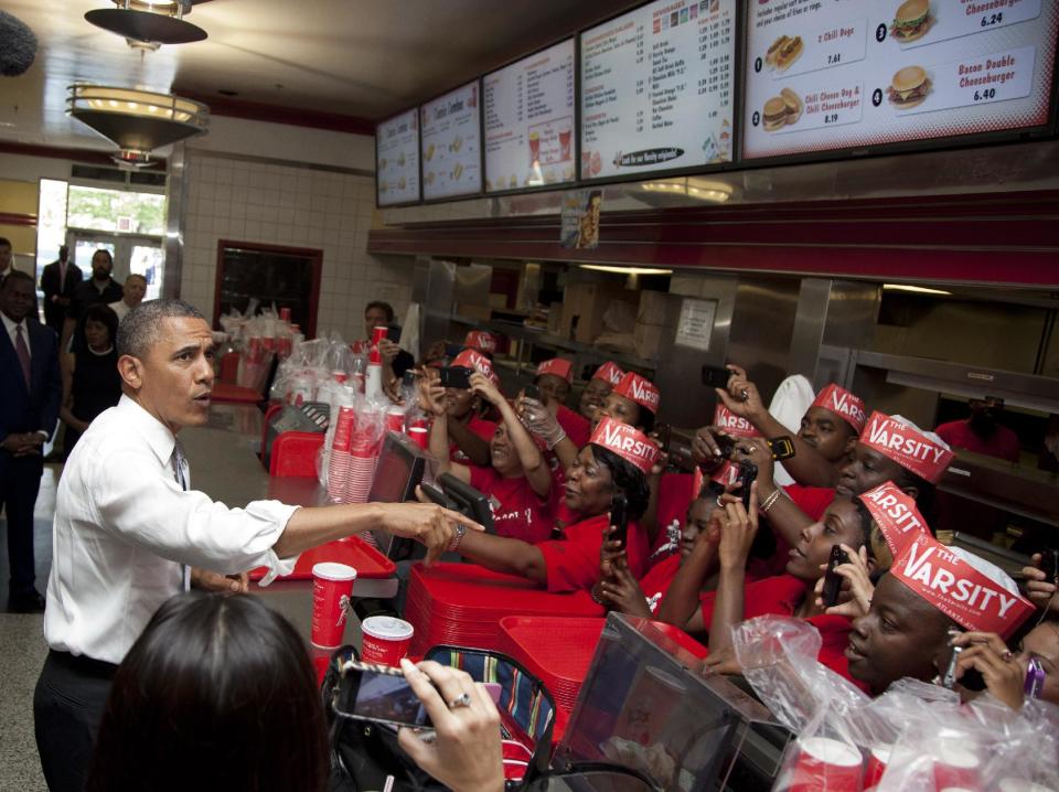 President Barack Obama places an order at The Varsity restaurant, Tuesday, June 26, 2012, in Atlanta. (AP Photo/Carolyn Kaster)