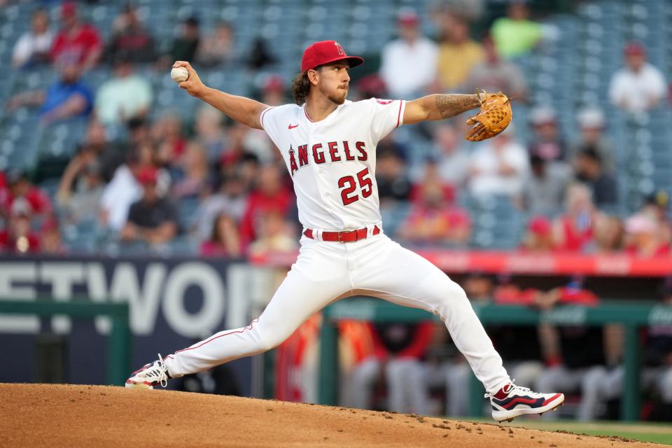 Apr 25, 2022; Anaheim, California, USA; Los Angeles Angels relief pitcher Michael Lorenzen (25) delivers a pitch in the second inning against the Cleveland Guardians at Angel Stadium. Mandatory Credit: Kirby Lee-USA TODAY Sports