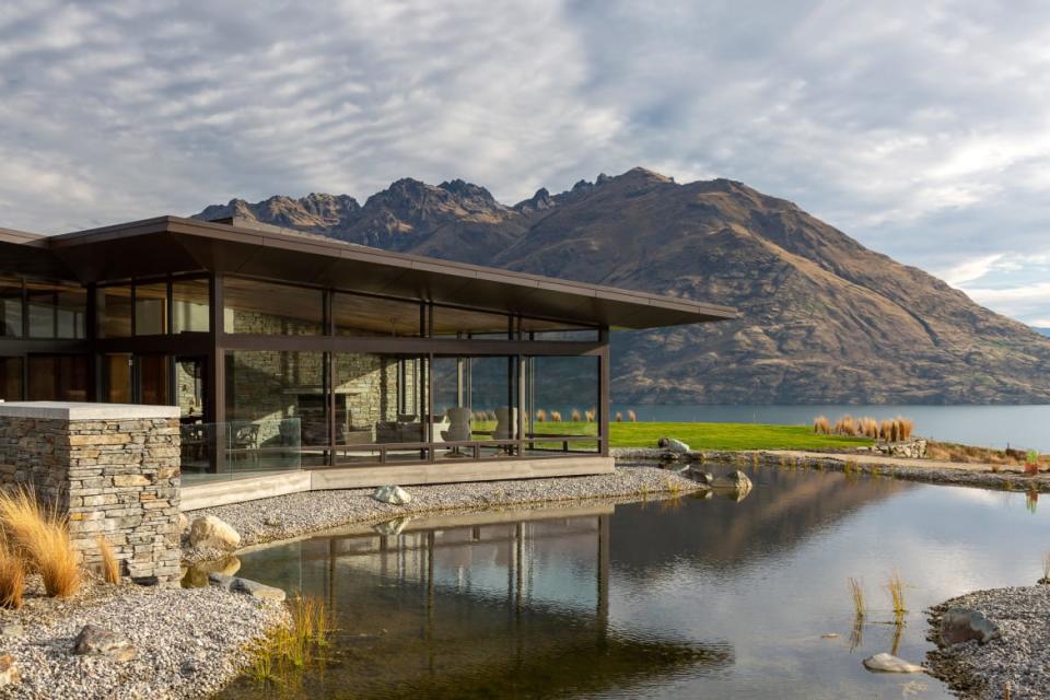 <div class="inline-image__caption"><p>What you’re looking at here is an effort at high-class camouflage. The house is clad in local schist stone, dark bronze steel, and concrete to create a seamless blending between mansion and mountains. It’s an answer to that age-old dilemma: you want to live in the utmost luxury (we’re looking at you, climate control and plush bedding), but also pretend you’re one with nature. </p></div> <div class="inline-image__credit">Sotheby's</div>