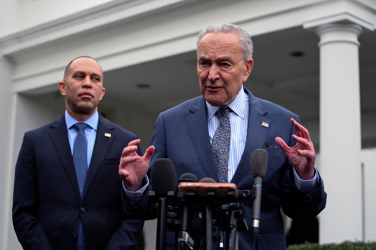 Senate Democratic leader Chuck Schumer speaks at a news conference as House Minority Leader Hakeem Jeffries, the highest-ranking House Democrat, looks on.  (Getty Images)