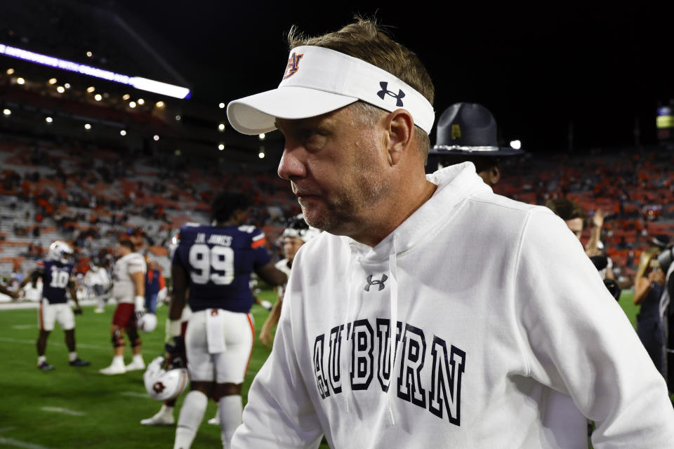 FILE - Auburn head coach Hugh Freeze walks off the field after a loss to New Mexico State in an NCAA college football game Saturday, Nov. 18, 2023, in Auburn, Ala. Auburn can cap Freeze’s first season back in the Southeastern Conference with a winning record by beating Maryland in the Music City Bowl. (AP Photo/Butch Dill, File)