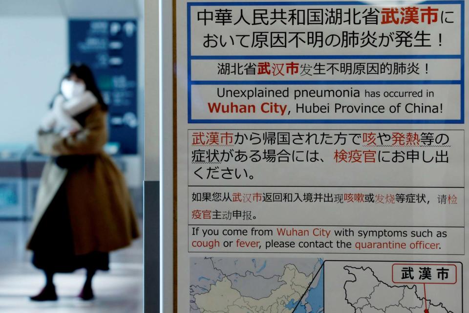 Quarantine notice: Health authorities have placed warnings about coughing or fever symptoms (REUTERS)