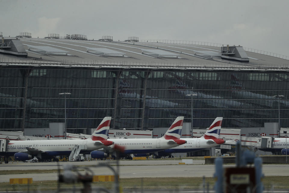 British Airways planes sit parked at Heathrow Airport in London, Monday, Sept. 9, 2019. British Airways says it has had to cancel almost all flights as a result of a pilots' 48-hour strike over pay. (AP Photo/Matt Dunham)