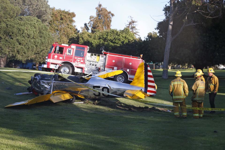 An airplane sits on the ground after crash landing at Penmar Golf Course in Venice, Los Angeles California March 5, 2015. "Star Wars" star Harrison Ford was seriously injured on Thursday when the actor crashed his vintage plane on a Los Angeles golf course shortly after taking off from a local airport, a source told Reuters. (REUTERS/Lucy Nicholson)