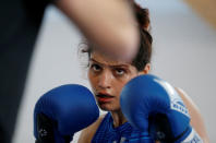 Iranian boxer Sadaf Khadem attends a training session in preparation to her first official boxing bout in Royan, France, April 11, 2019. REUTERS/Regis Duvignau