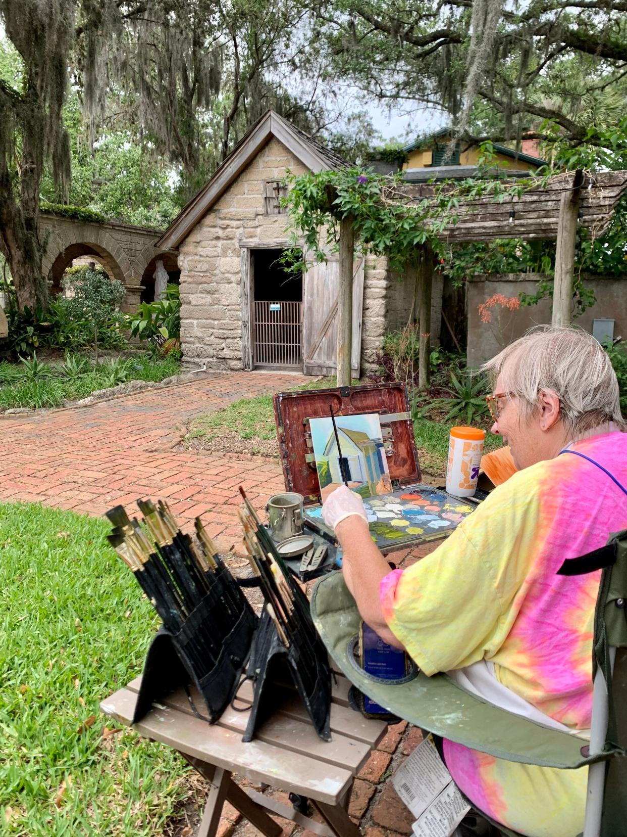 Artist Jacqueline Phaff-Pratt paints the detached colonial kitchen on the grounds of the Oldest House Museum Complex during the 7th annual Plein Air Paint Out.