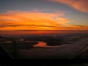 Picture taken by Swiss adventurer Andre Borschberg onboard Solar Impulse 2 (Si2) during the flight from Tusla/OK to Dayton/OH shows the Mississippi river at sunset, May 21, 2016. Andre Borschberg, Jean Revillard, Christophe Chammartin/SI2/Handout via Reuters