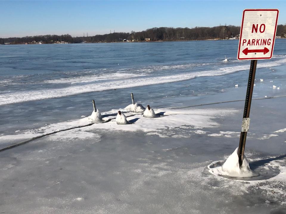 Ice forms Sunday but also leaves cracks along the shore, near a public access site, on Hudson Lake. The depth and quality of ice can vary on a given lake from one shore to the next.