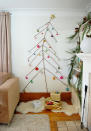 This tree is SUPER easy to make. Just collect some sticks and stick them to your wall. Simple. [Photo: The Art Of Doing Nothing]