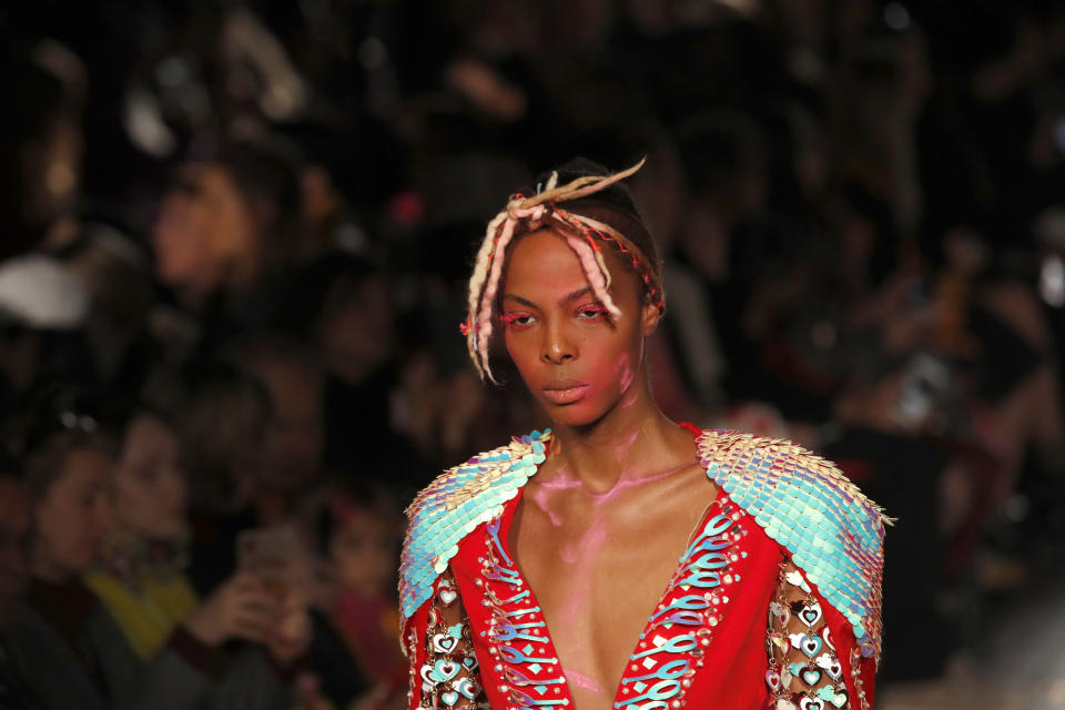 A model wears a creation as part of the Manish Arora ready to wear Fall-Winter 2019-2020 collection, that was presented in Paris, Thursday, Feb. 28, 2019. (AP Photo/Christophe Ena)