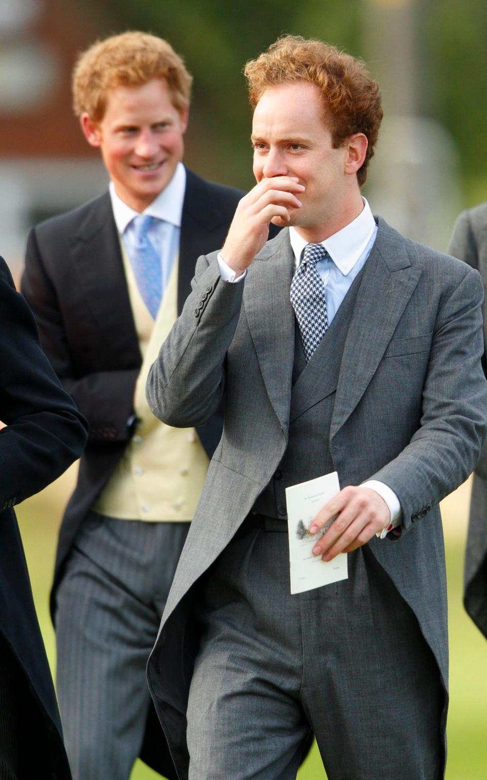 Prince Harry and Tom Inskip attend the wedding of James Meade and Lady Laura Marsham at the Parish Church of St. Nicholas in Gayton on September 14, 2013 near King's Lynn, - Max Mumby/Indigo