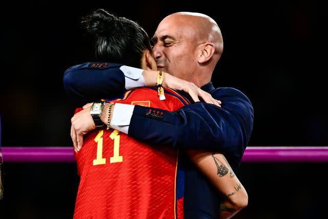 <p>Richard Callis / SPP/Sipa USA via AP</p> Luis Rubiales kisses the face of a player after Spain's World Cup win