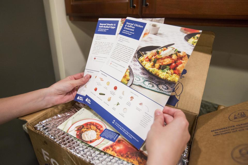 <strong><a href="https://www.blueapron.com/" target="_blank" rel="noopener noreferrer">Blue Apron</a></strong> takes the hassle out of searching for a recipe, buying the ingredients, and slaving over the stove. <strong><a href="https://www.blueapron.com/gifts" target="_blank" rel="noopener noreferrer">Give a gift card</a></strong> and your friend can select their own easy, top-rated recipes and have them delivered to their door. Buy a subscription for yourself, and both of you can plan to cook the same meal that night! That&rsquo;s almost like dinner together, right?