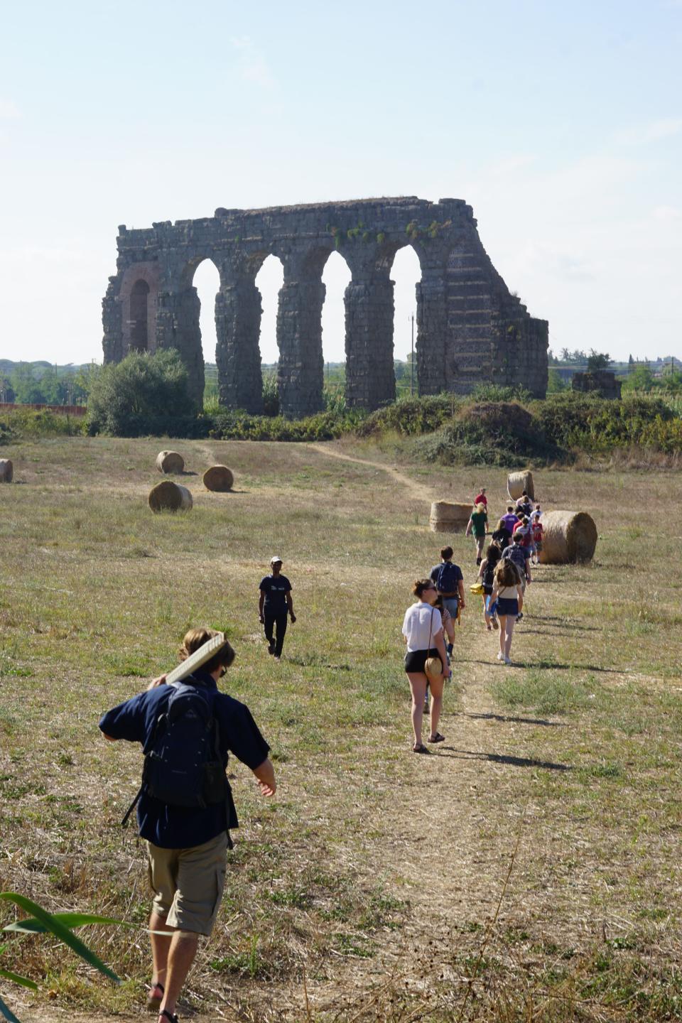 Students trek down to the Aqua Claudia, an aqueduct first commissioned by Caligula in 52 A.D.