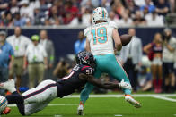 Houston Texans defensive end Will Anderson Jr. (51) forces Miami Dolphins quarterback Skylar Thompson (19) to fumble the ball during the first half of an NFL preseason football game, Saturday, Aug. 19, 2023, in Houston. Thompson recovered the fumble on the play. (AP Photo/Eric Gay)