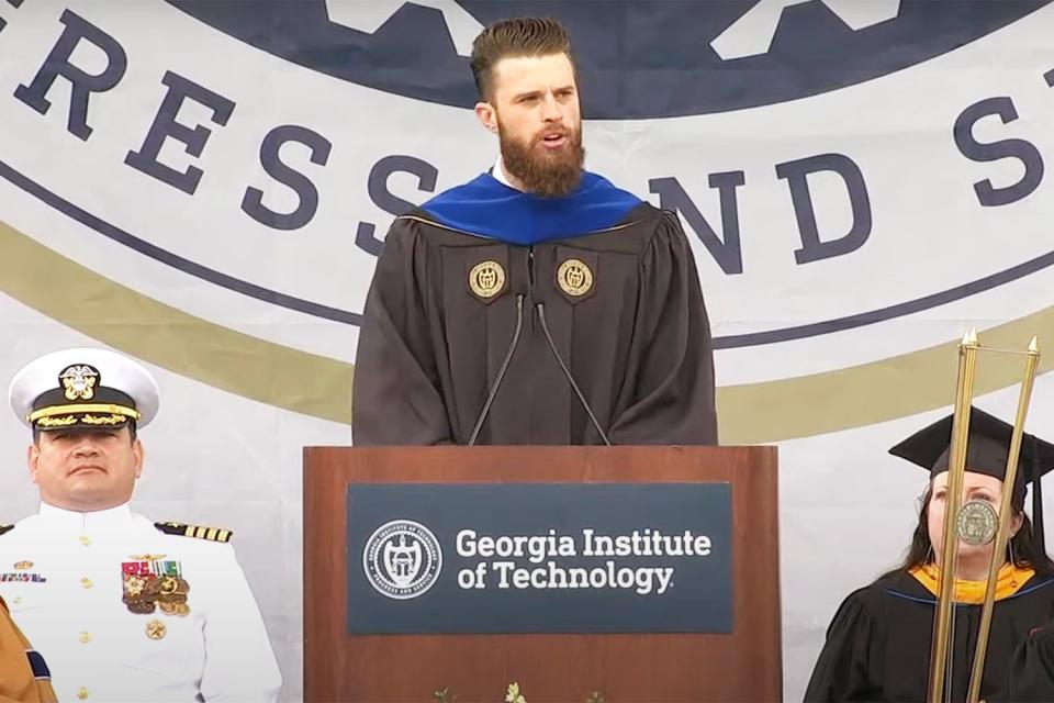 <p>Georgia Tech/Youtube</p> Harrison Butker in 2023 during his Georgia Institute of Technology commencement address
