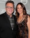 The <em>True Lies</em> actor confirmed to PEOPLE on Jan. 22 that he and wife Ashely Groussman <a href="https://people.com/tv/tom-arnold-ashley-groussman-split/" rel="nofollow noopener" target="_blank" data-ylk="slk:split;elm:context_link;itc:0;sec:content-canvas" class="link ">split</a> after 10 years of marriage. The couple share son Jax, 5, and daughter Quinn, 3. "It’s not super fun but it’s okay. It’s the right thing," Arnold said. "We tried to make it work. It wasn’t a big dramatic thing. It wasn’t all of a sudden. We definitely grew apart. It’s been a rough couple of years." This was Arnold's fourth marriage. He was previously married to Shelby Roos (from 2002 to 2008), Julie Armstrong (from 1995 to 1999), and <a href="https://people.com/tag/roseanne-barr/" rel="nofollow noopener" target="_blank" data-ylk="slk:Roseanne Barr;elm:context_link;itc:0;sec:content-canvas" class="link ">Roseanne Barr</a> (from 1990 and 1994).