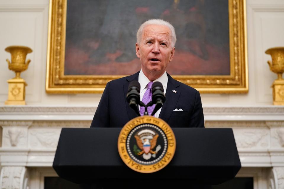 President Joe Biden speaks about the coronavirus in the State Dinning Room of the White House, Thursday, Jan. 21, 2021, in Washington.