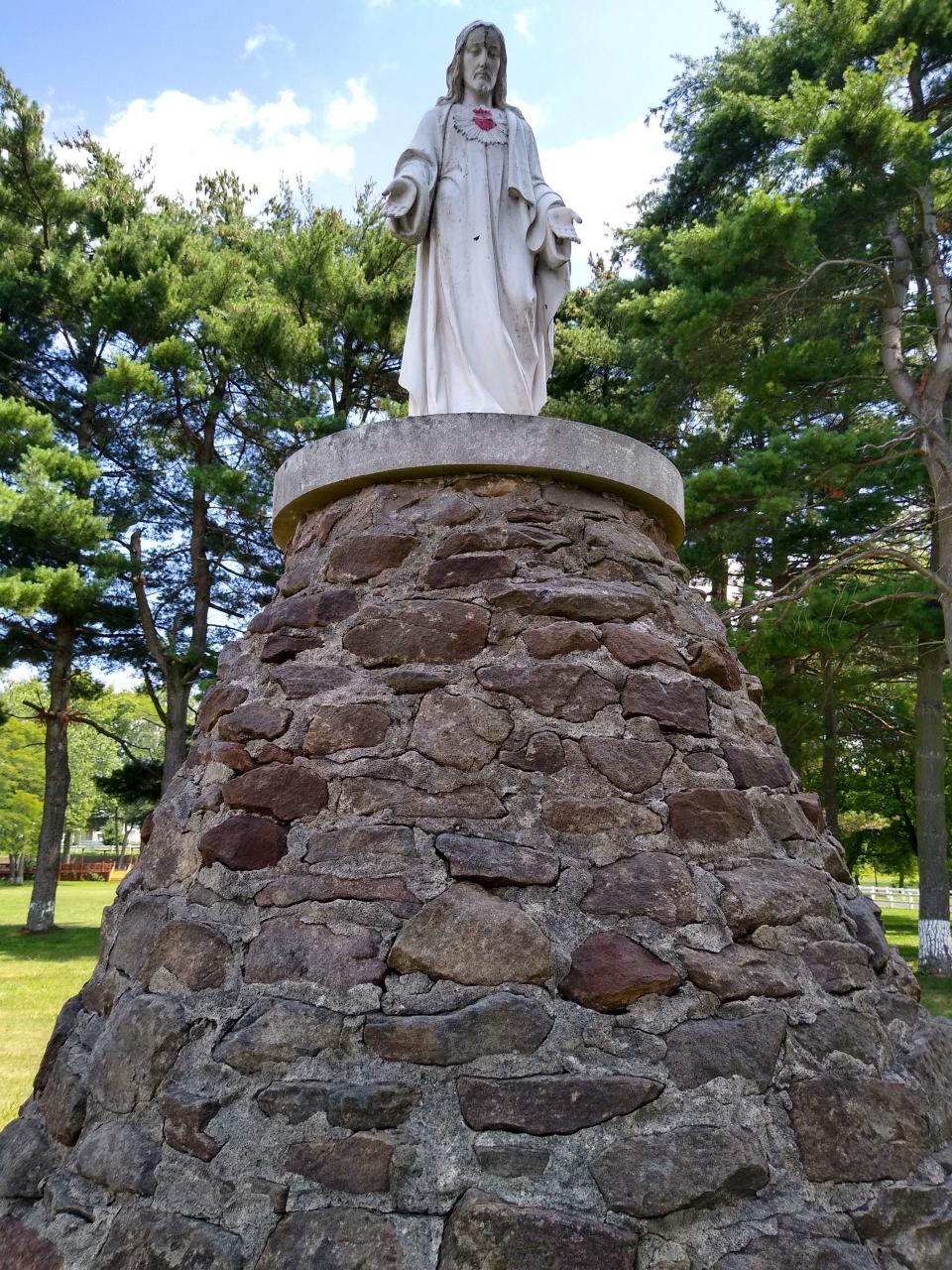 A statue of Jesus stands atop a shrine at IBH Addiction Services, the former Infant of Prague Villa, at 3445 S. Main St. in Coventry Township.