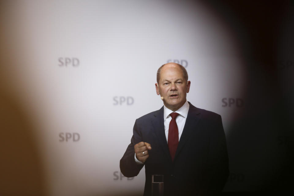 German Finance Minister Olaf Scholz attends a news conference in Berlin, Germany, Monday, Aug. 10, 2020. Olaf Scholz announces that he will run for the for the Social Democratic Party as chancellor candidate at next year's general elections in Germany.(AP Photo/Markus Schreiber)