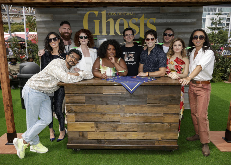 SAN DIEGO - JULY 21: The cast of the CBS Original Series GHOSTS makes a panel appearance at Comic-Con International: San Diego on Thursday, July 21, 2022. Pictured (L-R): Sheila Carrasco as Flower, Utkarsh Ambudkar as Jay, Devan Chandler Long as Thorfinn,  Rebecca Wisocky as Hetty, Danielle Pinnock as Alberta, Richie Moriarty as Pete,  Asher Grodman as Trevor, Brandon Scott Jones as Isaac, Rose McIver as Samantha and Roman Zaragoza as Sasappis. (Photo by Francis Specker/CBS via Getty Images)